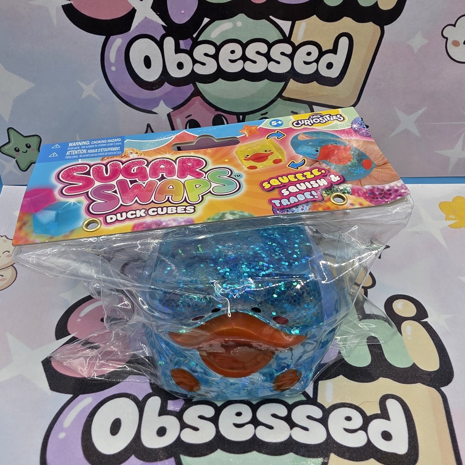 100% Authentic ORB Curiosities Sugar Swaps Duck Cube Glitter Squishy- 1pc (Blue)1